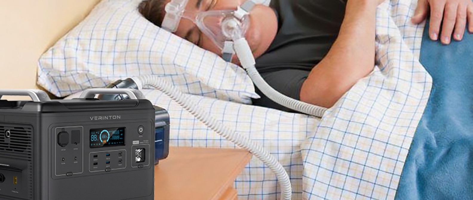 VERINTON Apex 2400 Pro on a bedside table powering a CPAP machine while a man sleeps